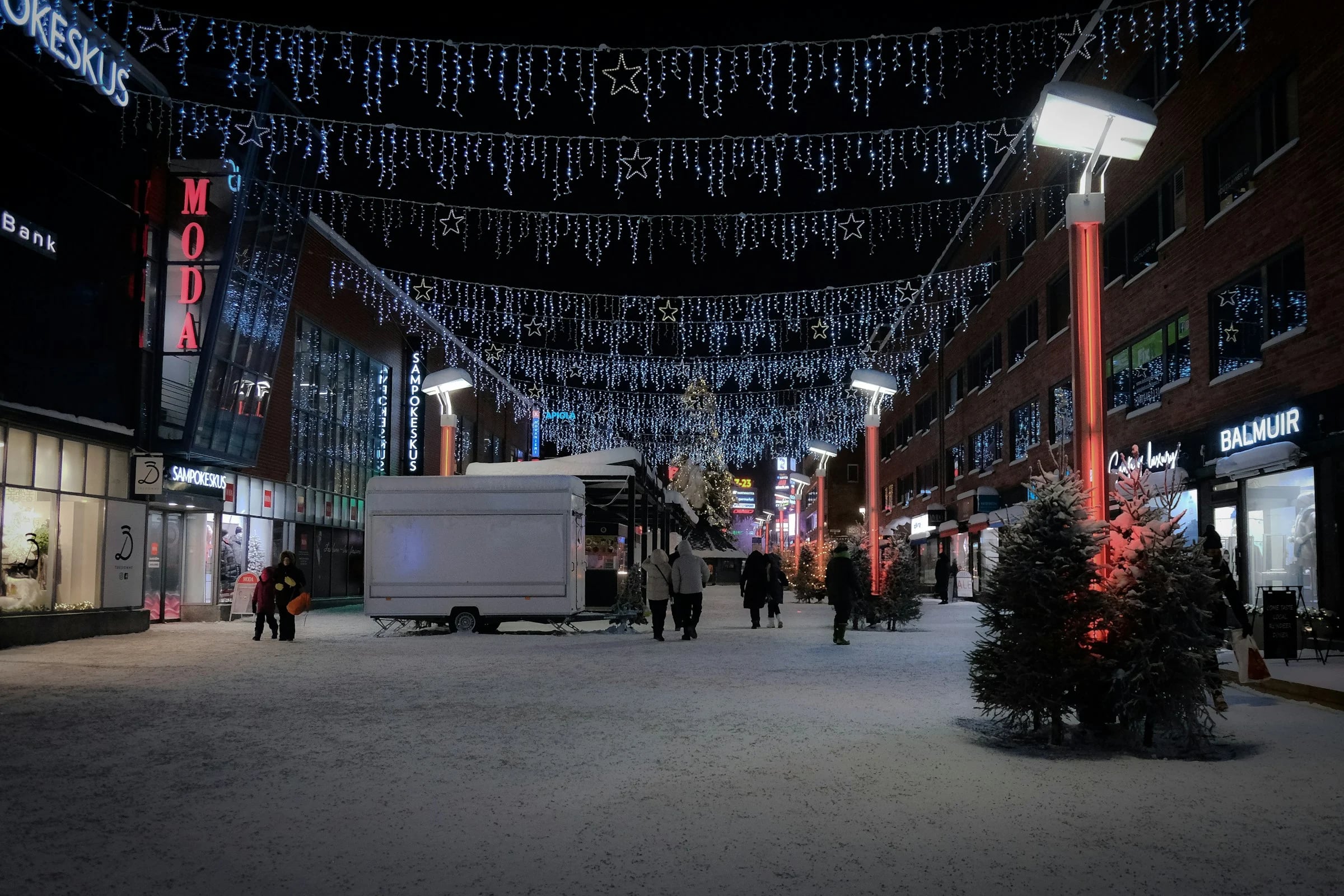 A snowy Rovaniemi street lit for winter